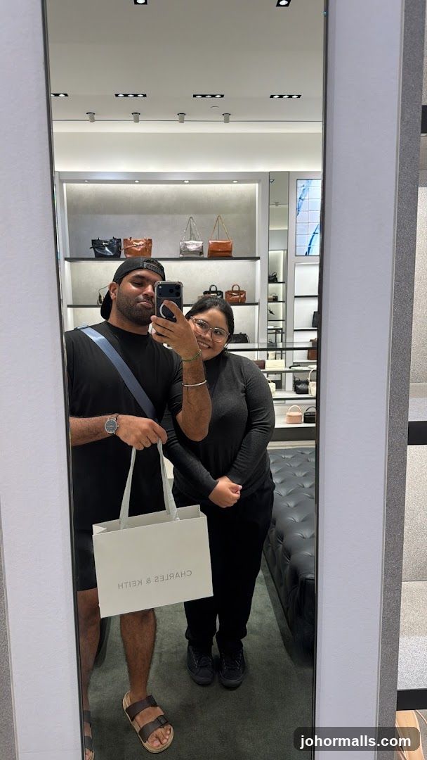 Couple Taking a Mirror Selfie in a Store