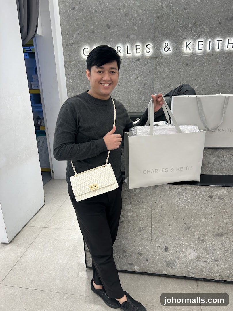 Man with Charles & Keith Bag