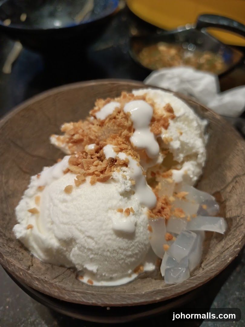 Ice cream dessert in wooden bowl