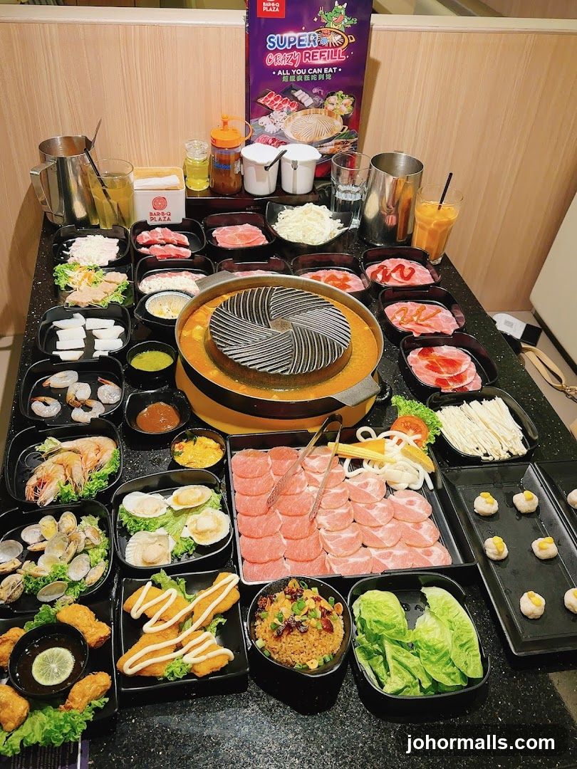 Grilled meat and seafood buffet setup