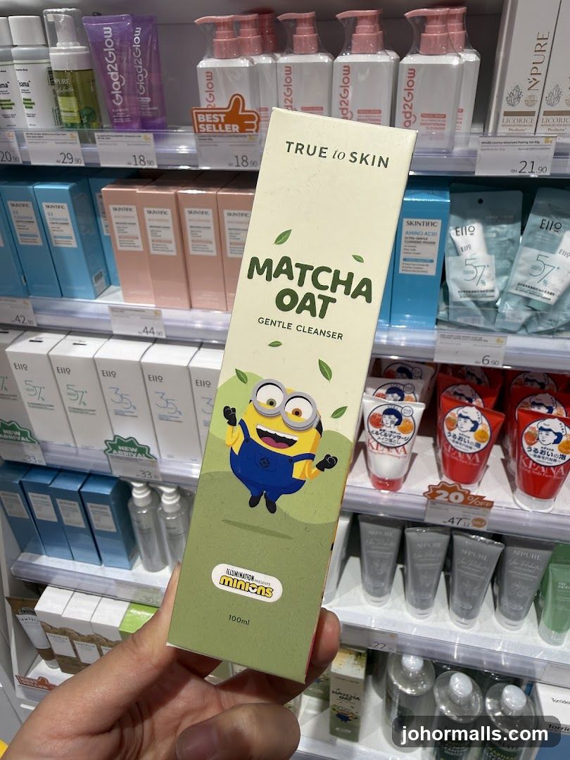 Hand holding product in store aisle