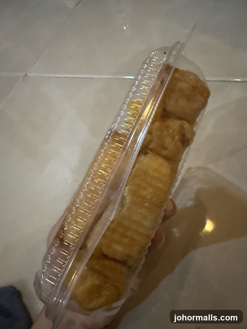 Hand holding packaged food