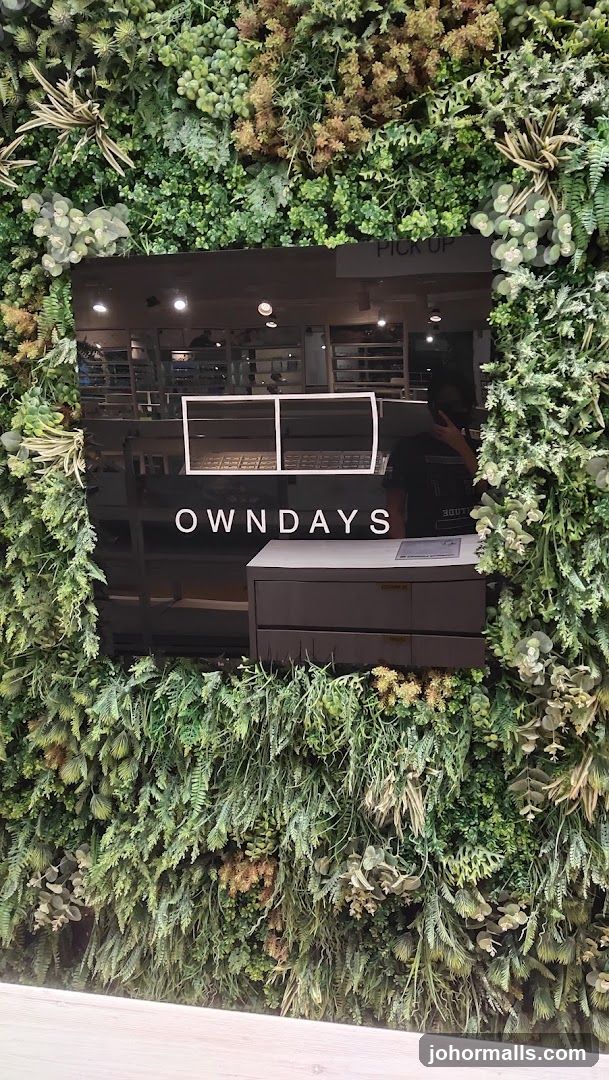 Eyewear store with vertical garden facade
