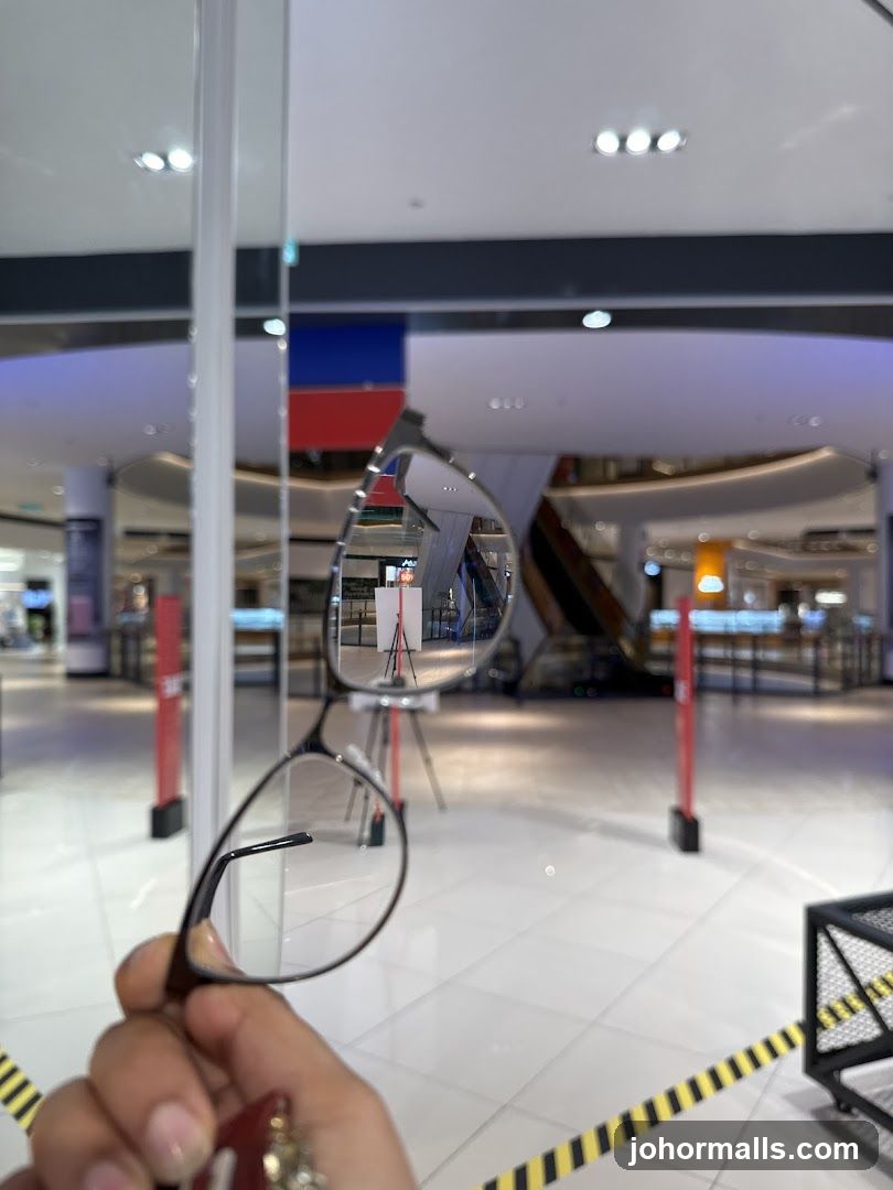Eyeglasses reflecting a store interior