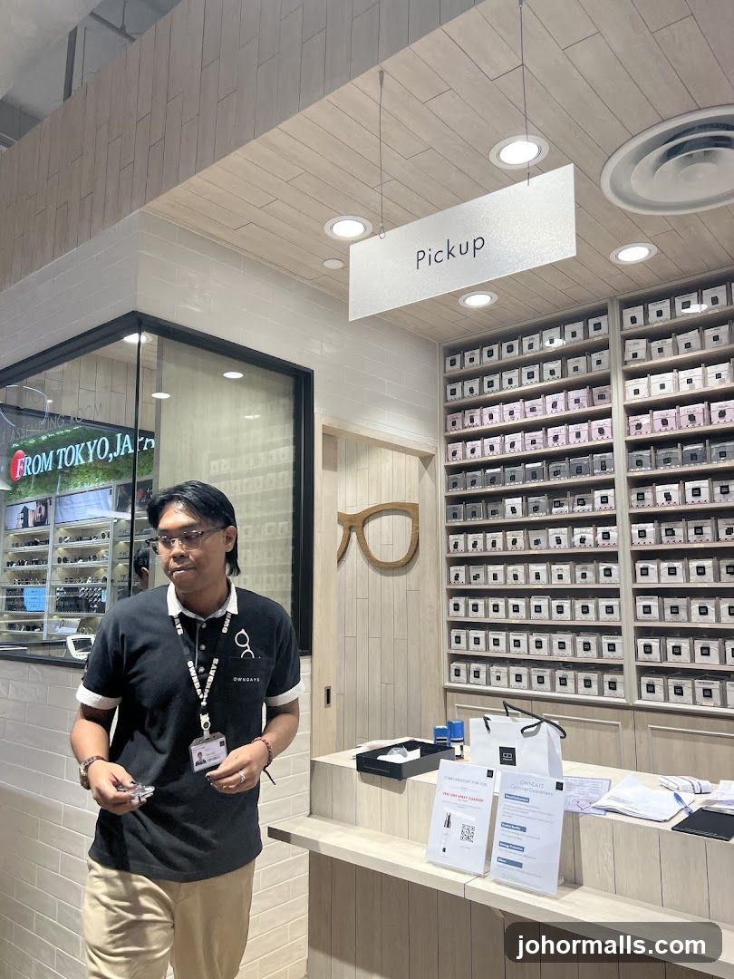 Optician's store interior with staff