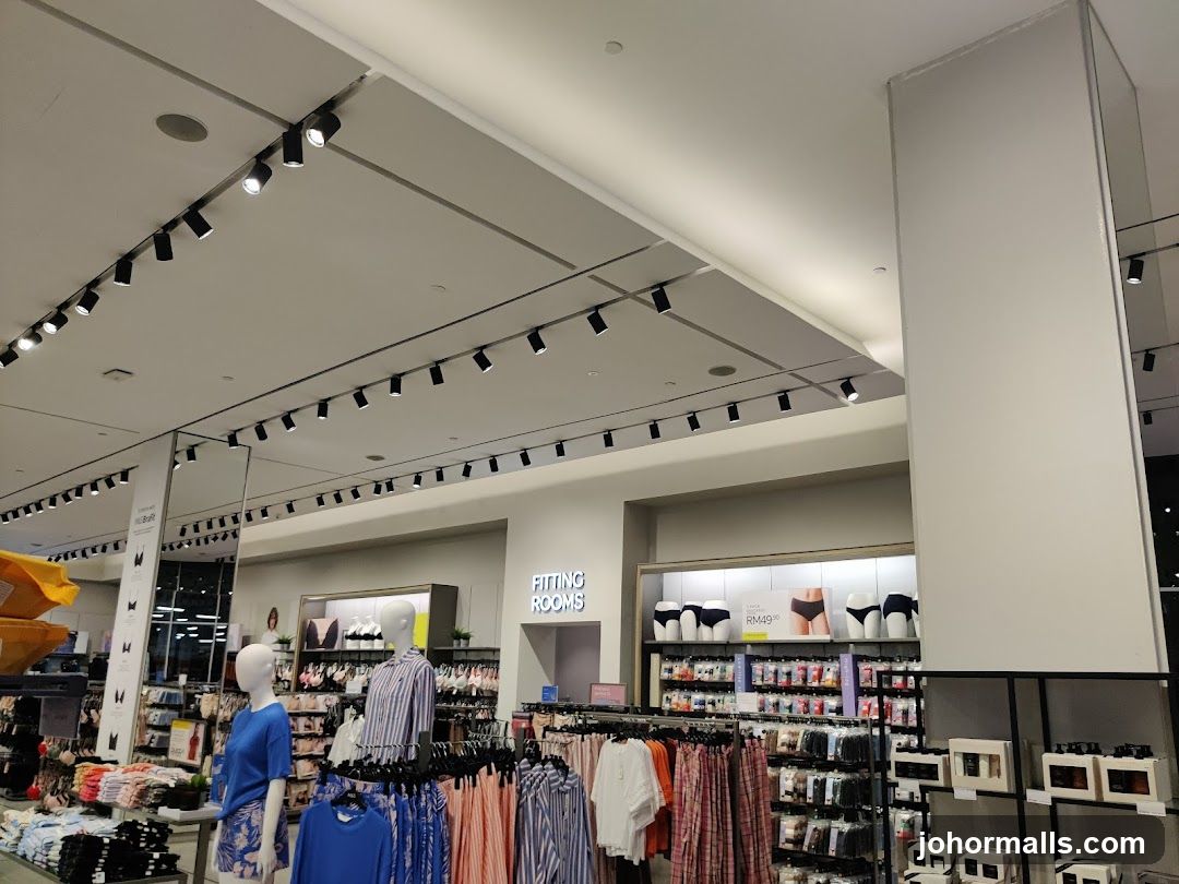 Clothing store interior with fitting rooms