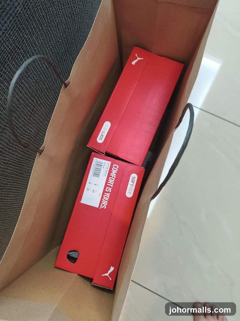 Puma Shoe Boxes in Shopping Bag