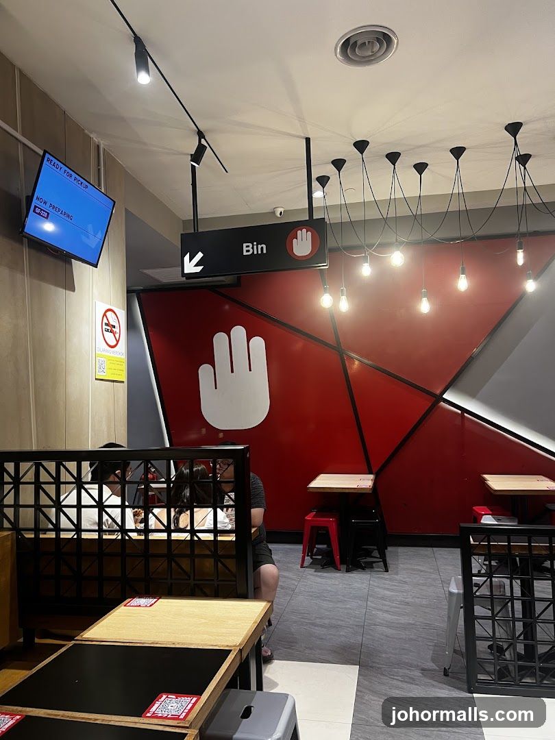 Restaurant Interior with Seating and Signage
