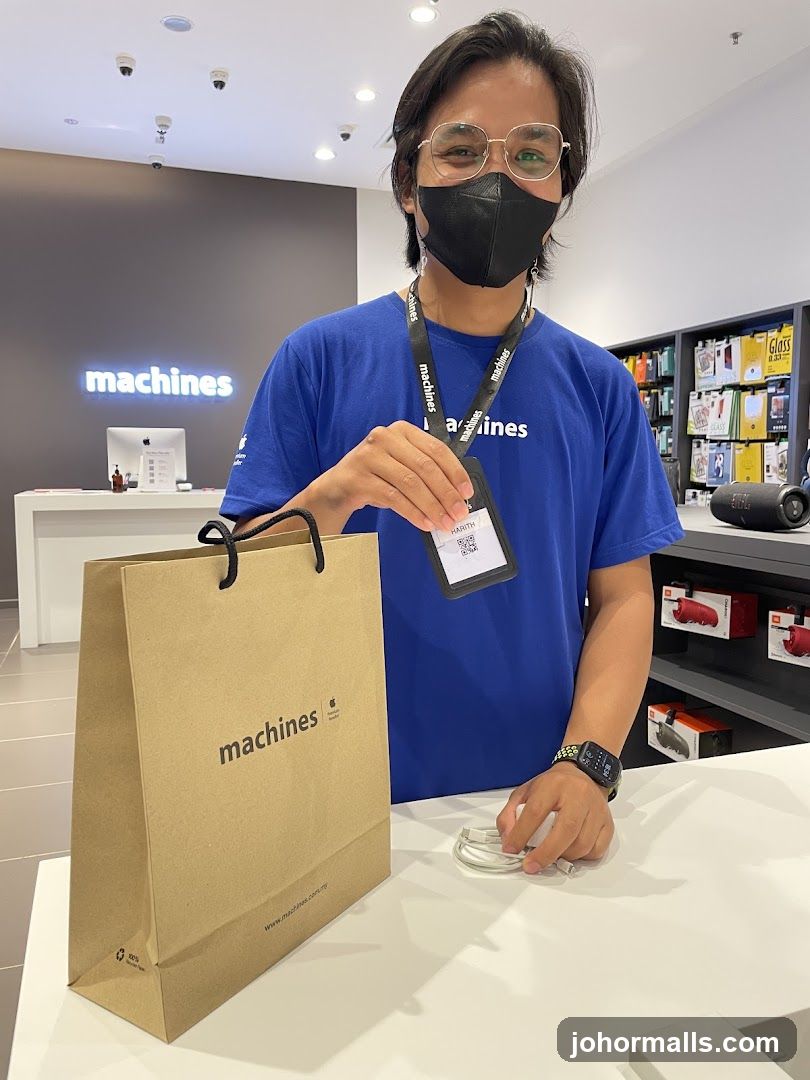 Salesperson holding a shopping bag