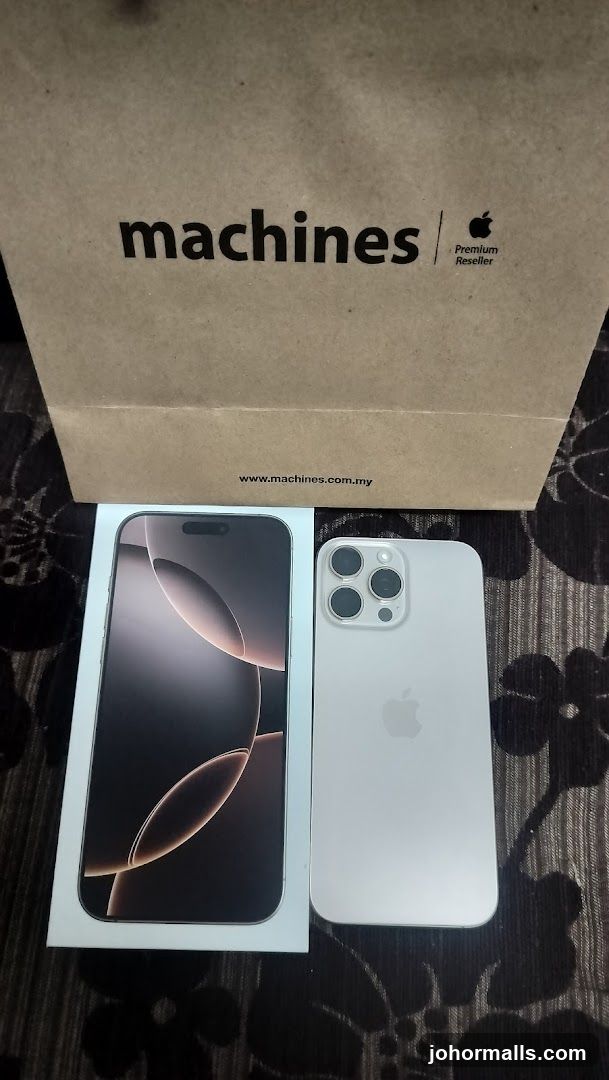 iPhone 14 Pro with branded bag