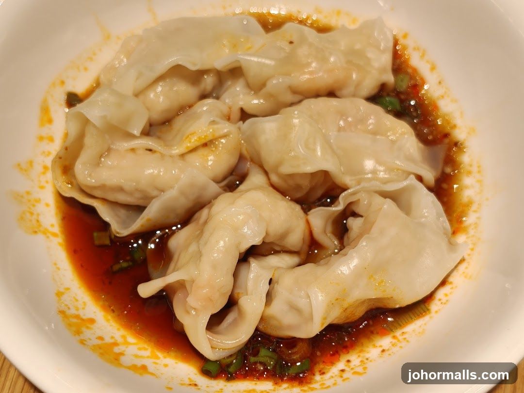 Dumplings in spicy sauce