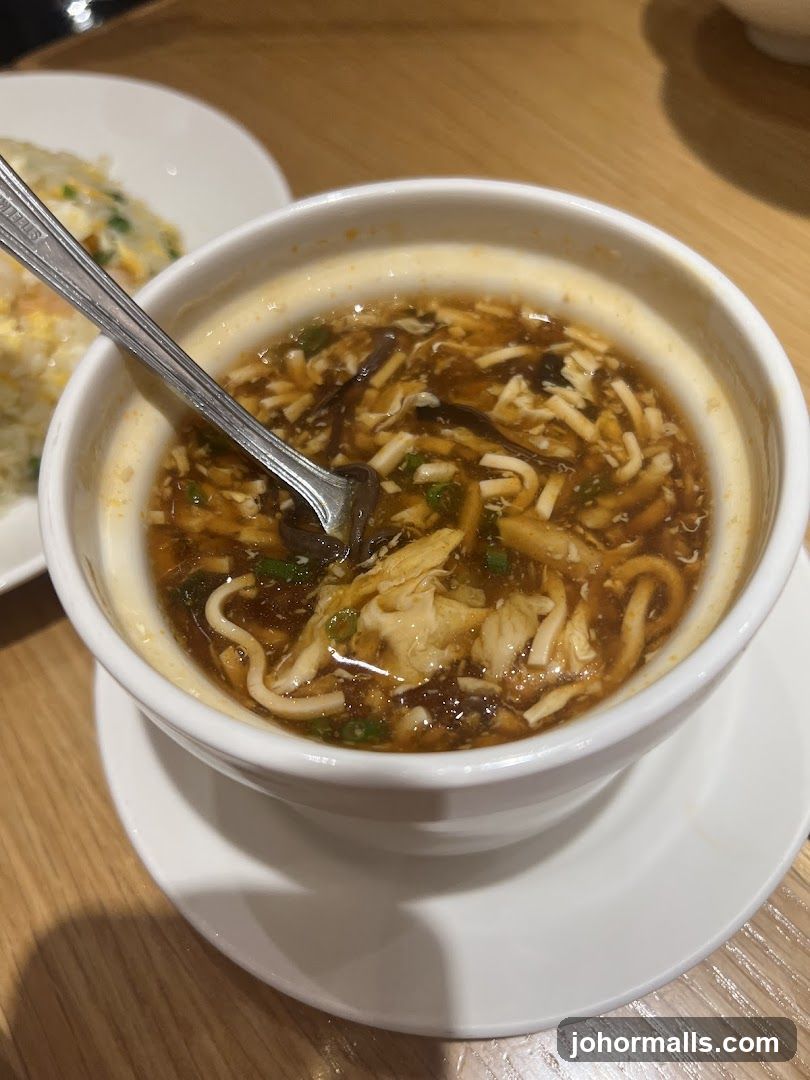 Soup in bowl with spoon