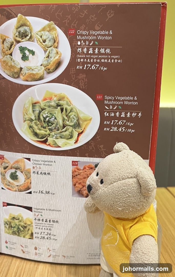 Teddy bear in front of menu