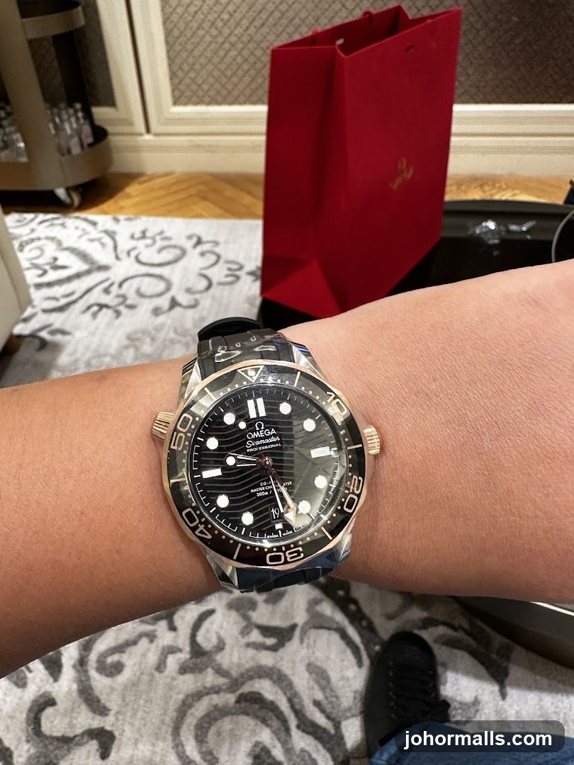 Wristwatch with Red Bag in Background