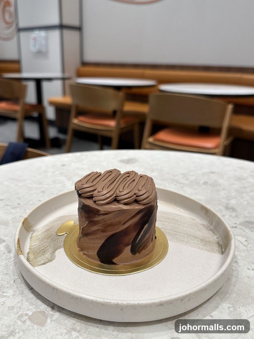 Chocolate Cake in Café Interior