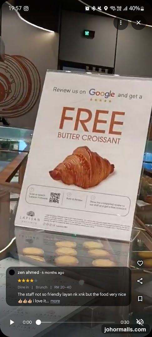 Promotional Sign for Free Butter Croissant