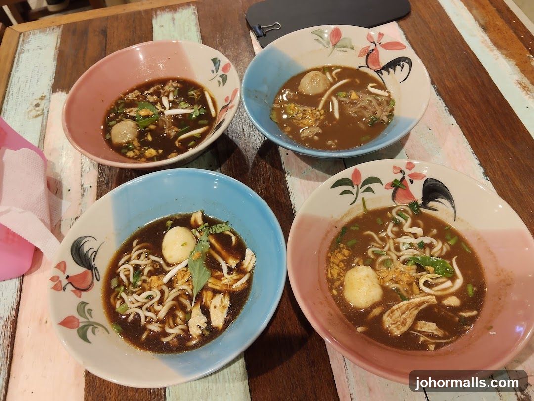 Four bowls of noodle soup