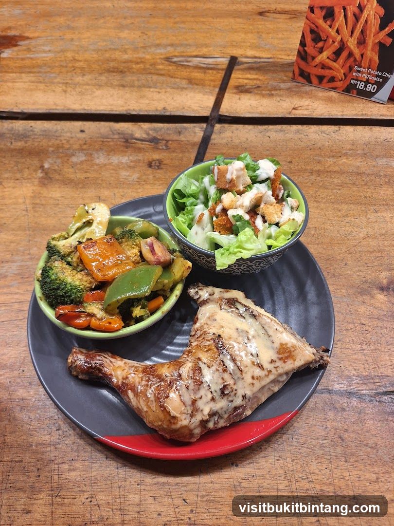 Grilled Chicken Meal with Salad and Vegetables