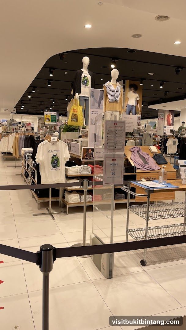Clothing store interior with mannequins and displays