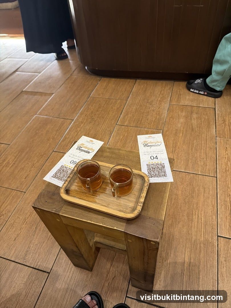Two cups of tea on a wooden stool