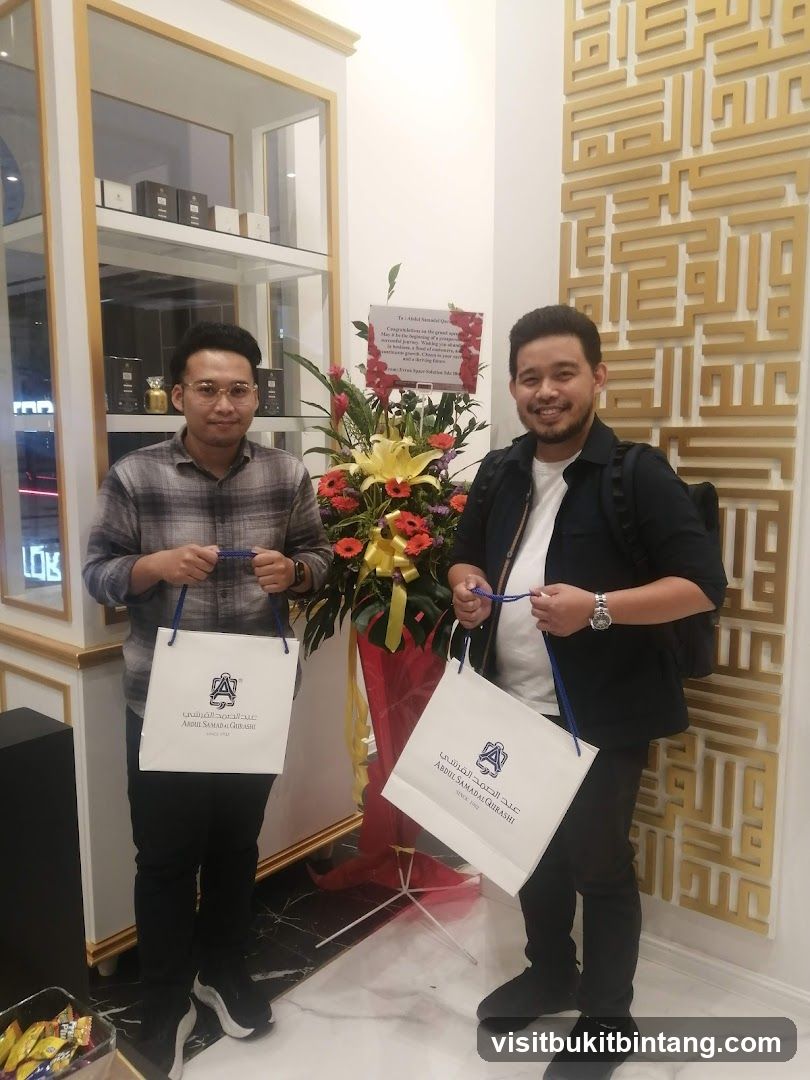 Two men holding shopping bags in a store