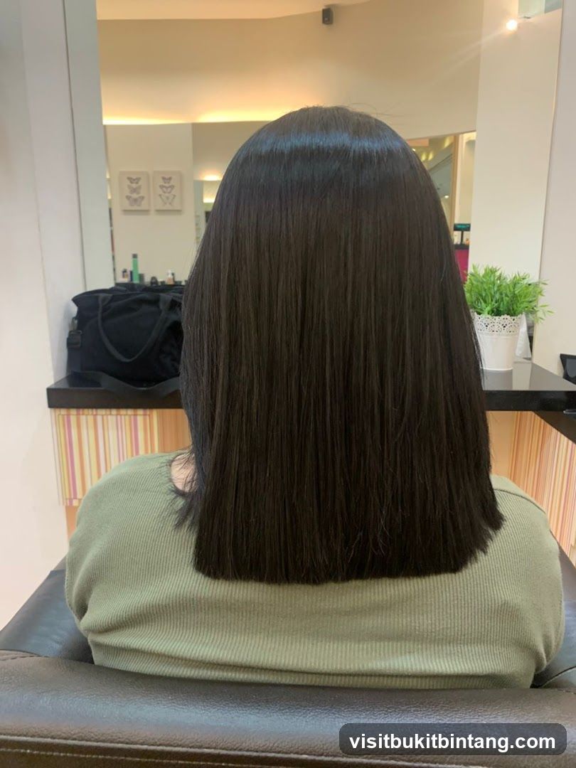 Woman with freshly cut dark hair