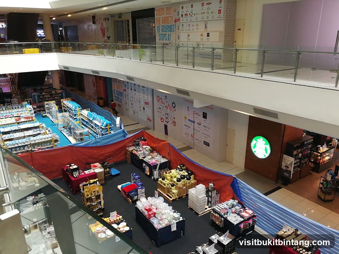 Mall Interior with Pop-Up Stalls and Starbucks