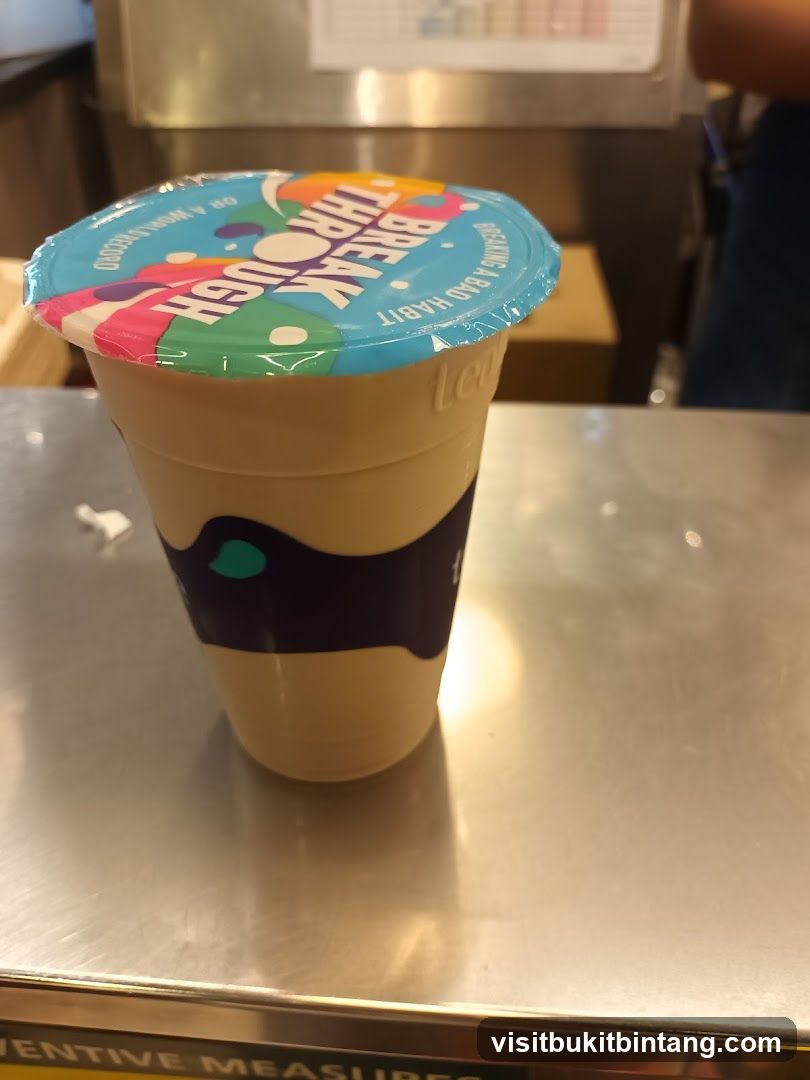 Beverage with colorful lid