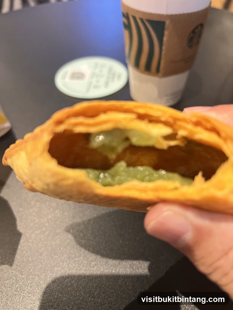 Pastry with Green Filling and Coffee Cup