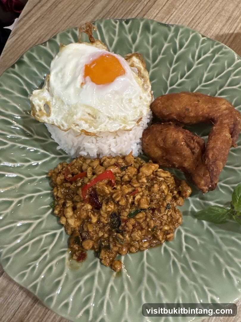 Thai Basil Chicken with Fried Egg and Wings
