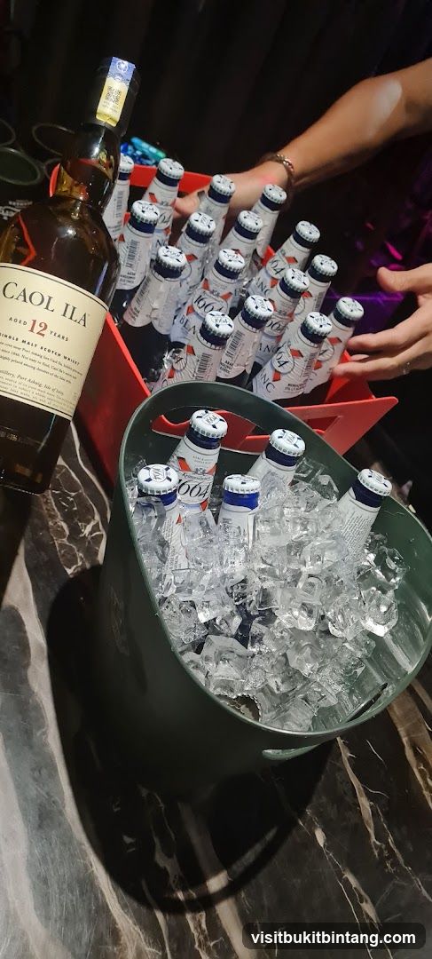 Bottles of Beer and Scotch Whisky