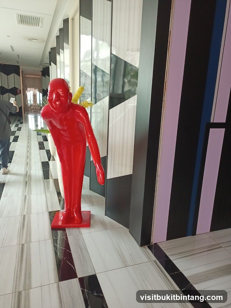 Red Sculpture in Hallway
