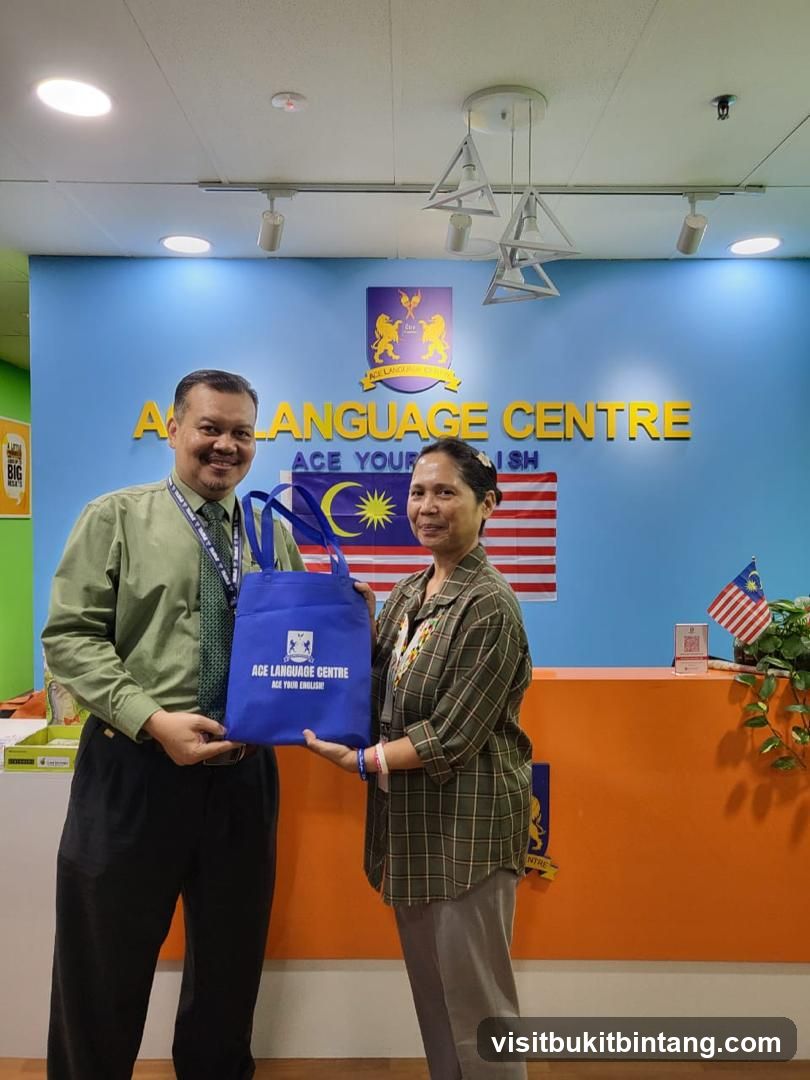Staff at Language Centre Receiving Gift Bag