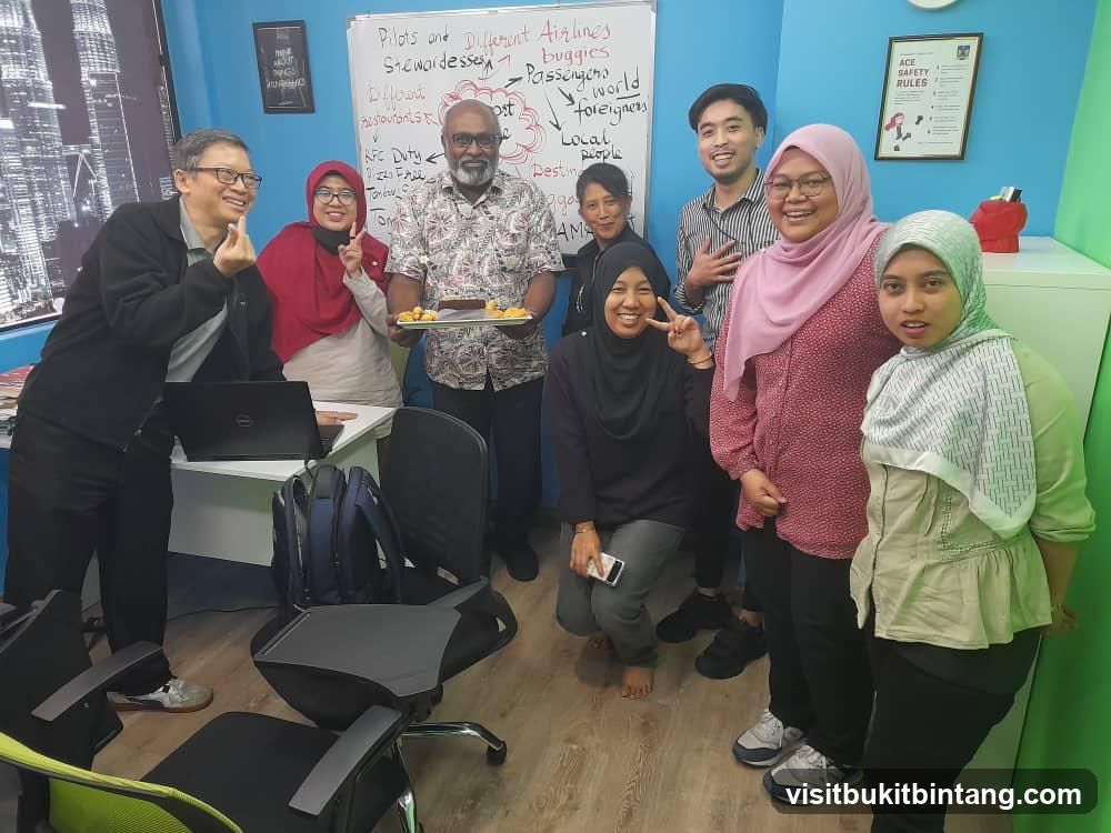 Group photo in office or classroom setting