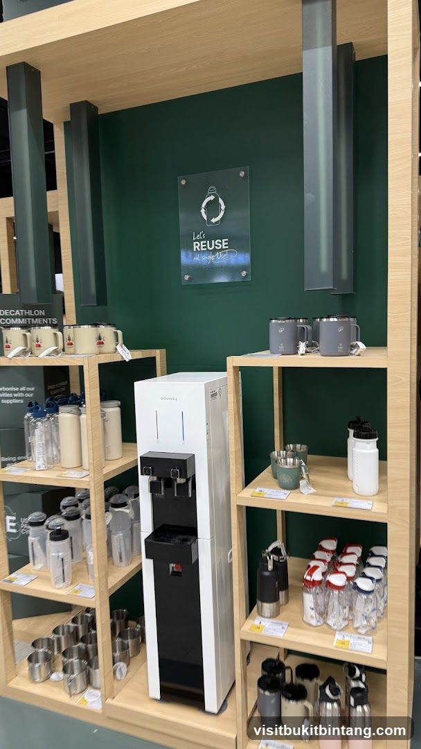 Display of reusable drinkware and water dispenser
