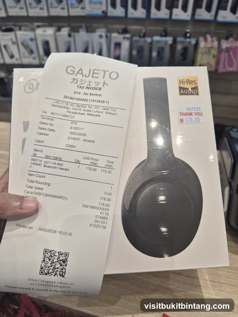 Tax Invoice and Headphones