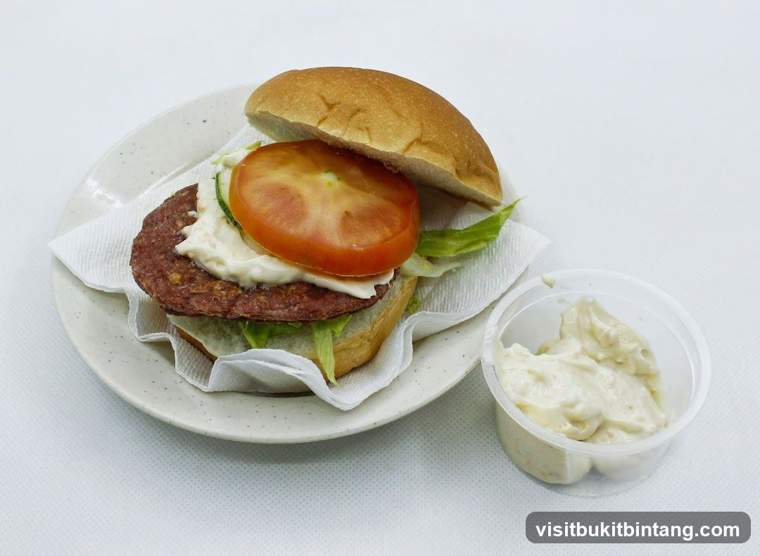 Burger with side of sauce