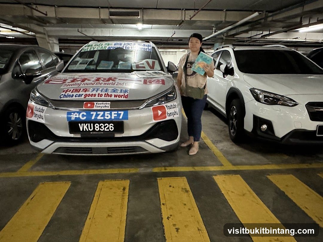 Woman Posing with a Decorated Electric Car
