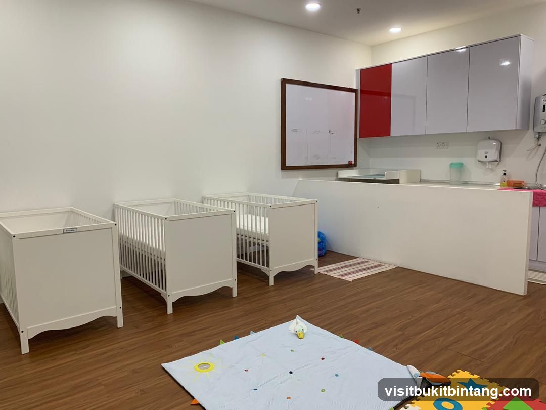 Nursery Room with Cribs and Changing Station