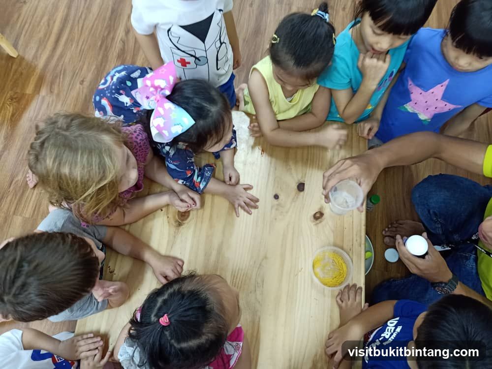 Children gathered around a table for an activity