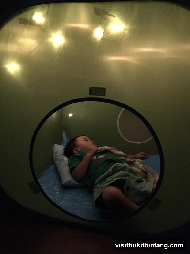 Child sleeping in a tent