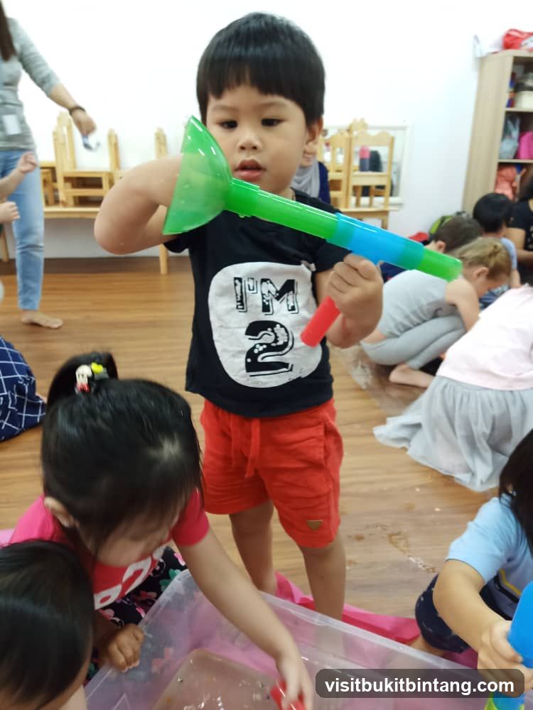 Children playing with water toys