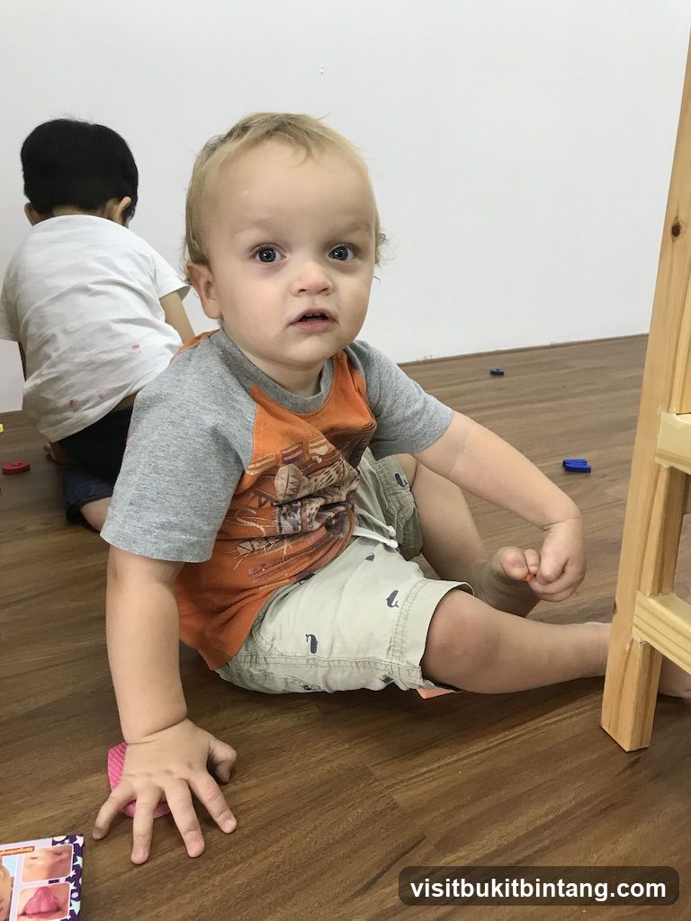 Toddler Sitting on Floor