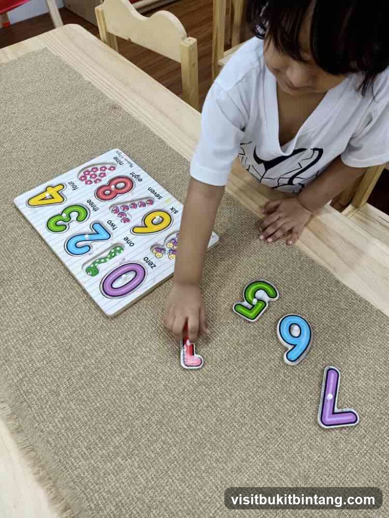 Child playing with number puzzle