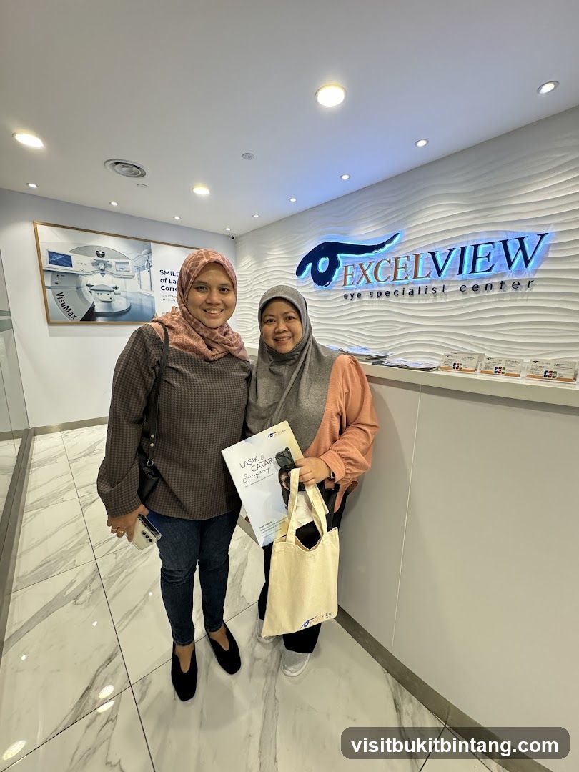 Two women in front of an eye specialist center