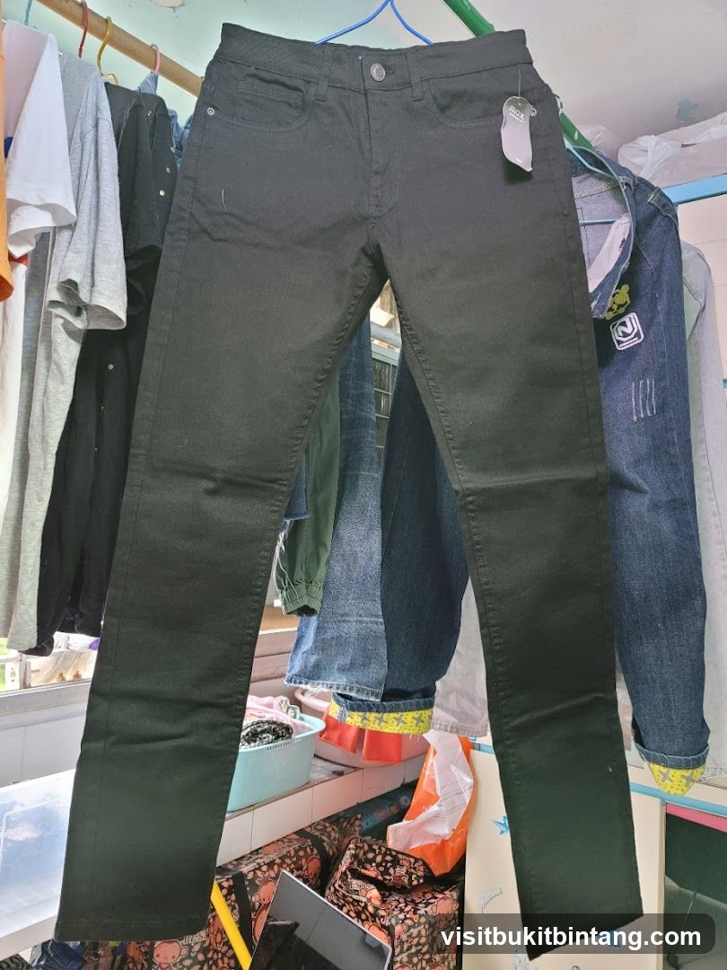 Black Jeans Hanging with Other Clothes