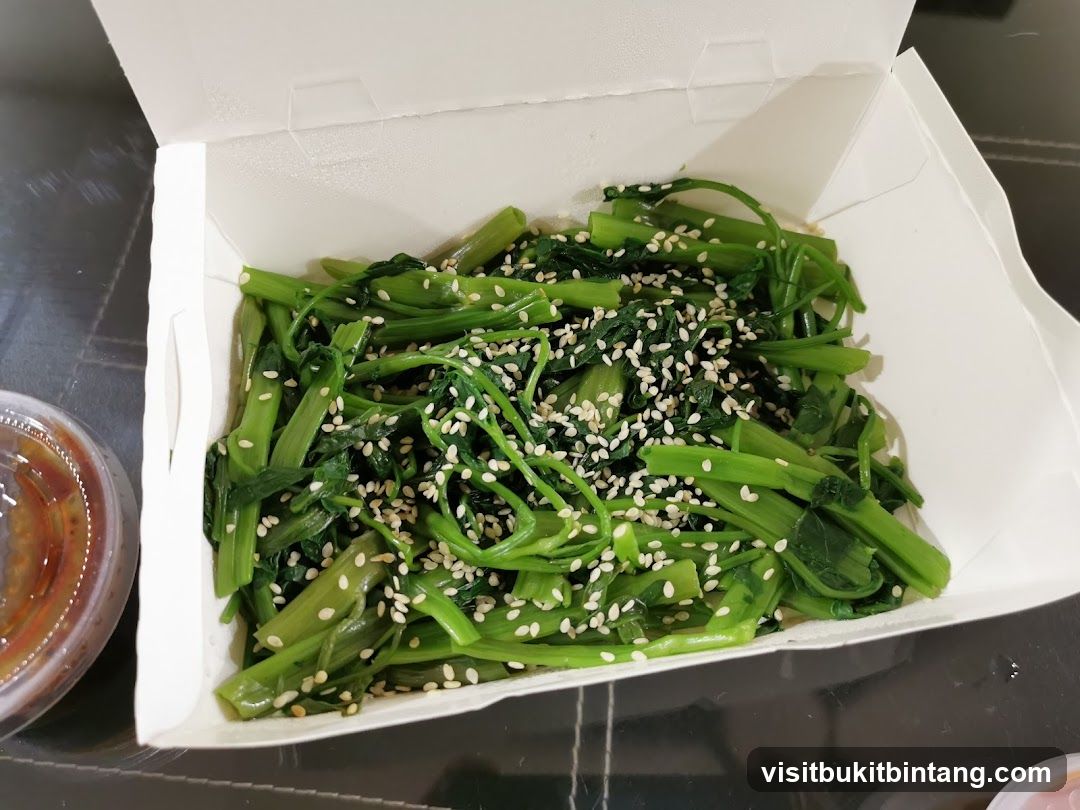 Sesame Tossed Greens in Takeout Container