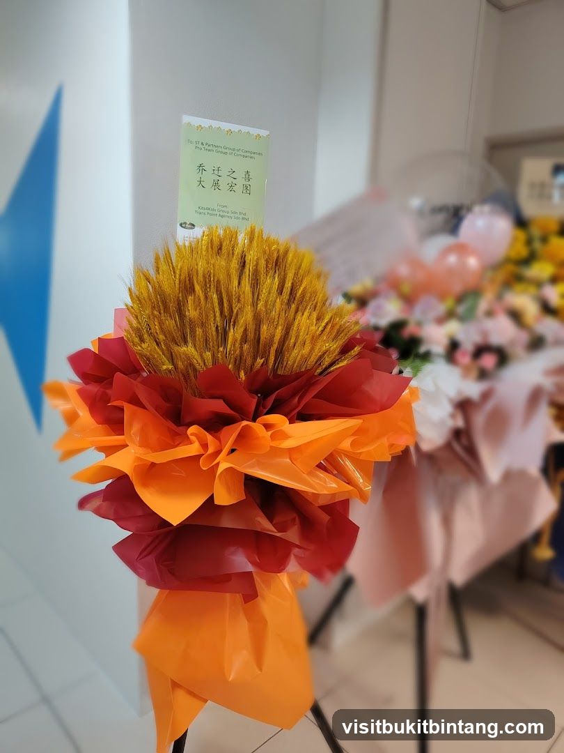Flower arrangement with wheat and colorful paper