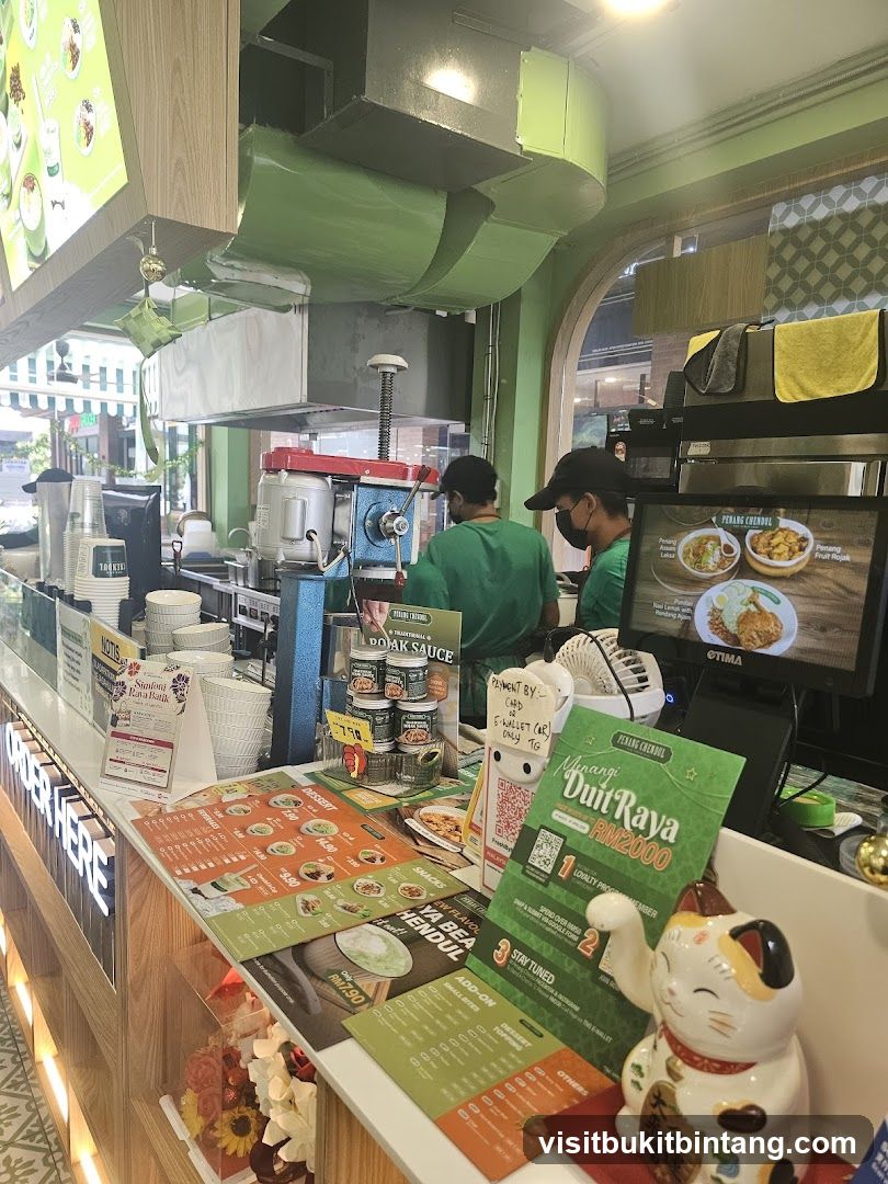 Counter with food displays and staff