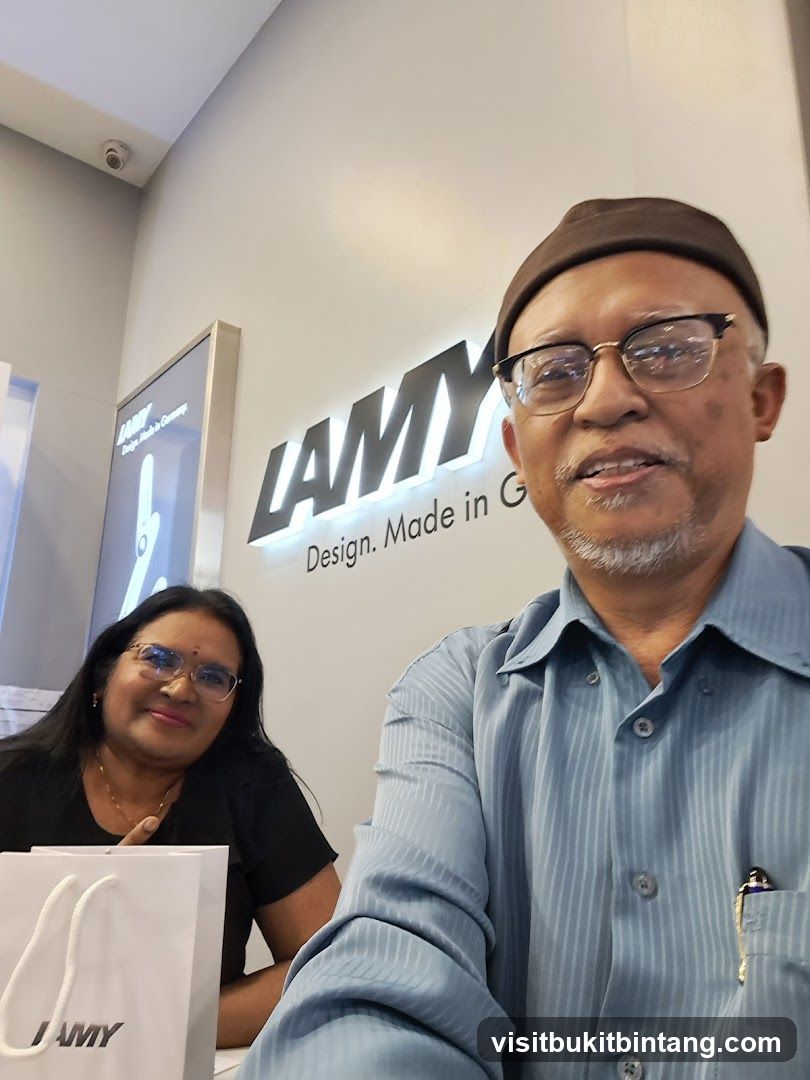 People in front of Lamy Sign